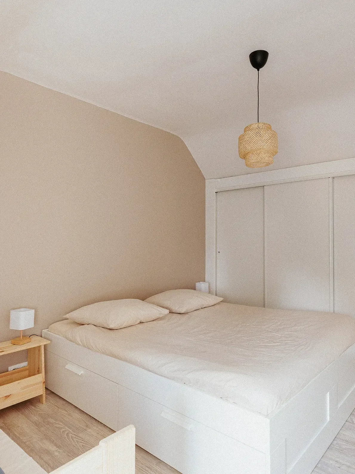 The master bedroom has a queen-size bed.